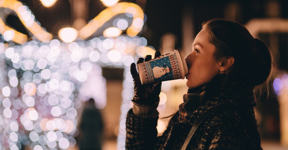 person drinking hot chocolate on the NYC streets