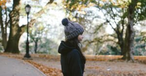 woman in NYC park in fall