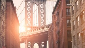 New York City in a populated area as the sun sets