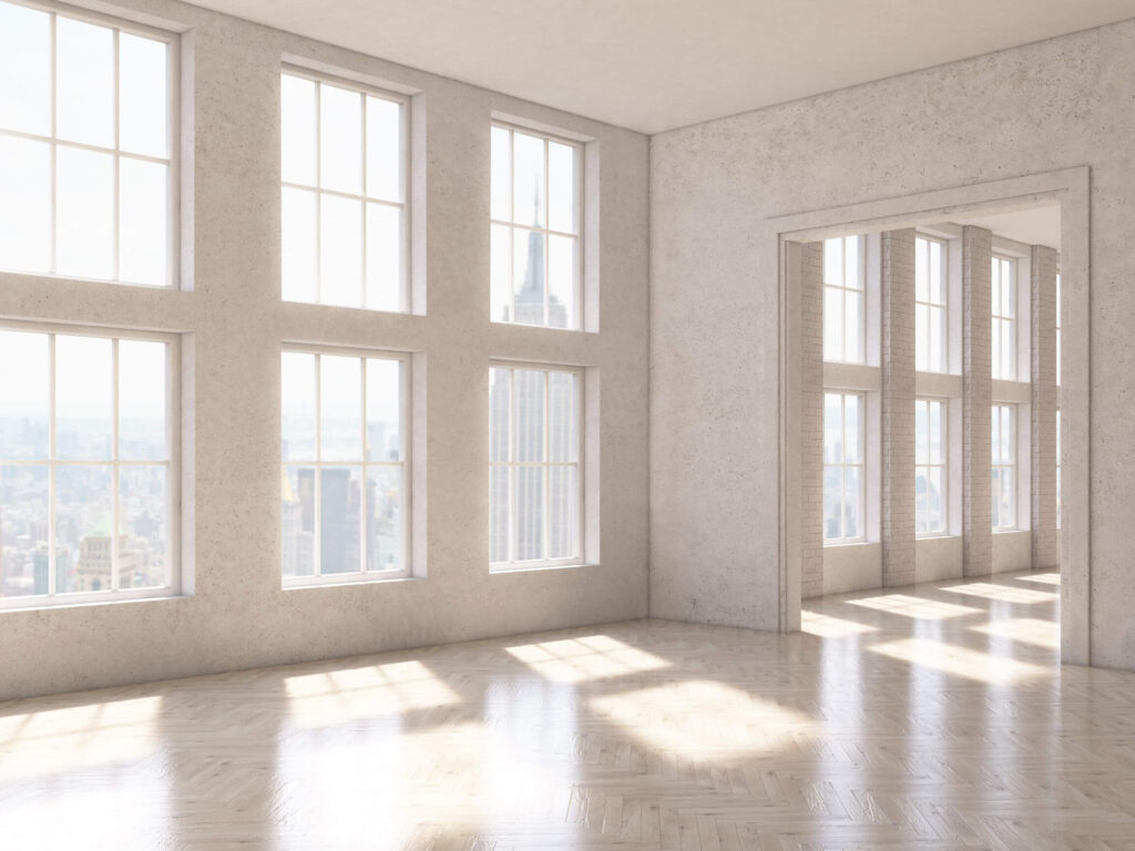 Condo in NYC with large windows overseeing the city